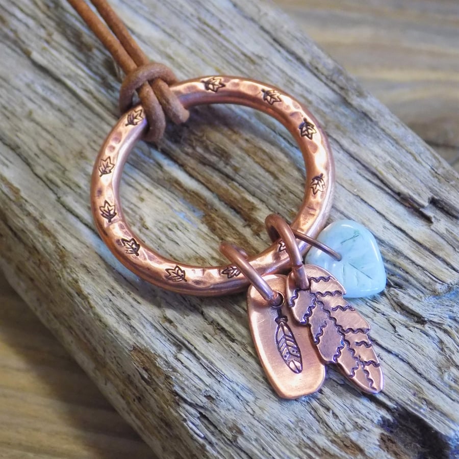 Chunky aged copper hoop 'leaves and feathers' charm pendant 