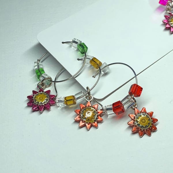 Six pack of sunflower wine glass charms