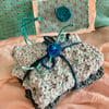 A pair of eco friendly hand knitted cotton dishcloths 
