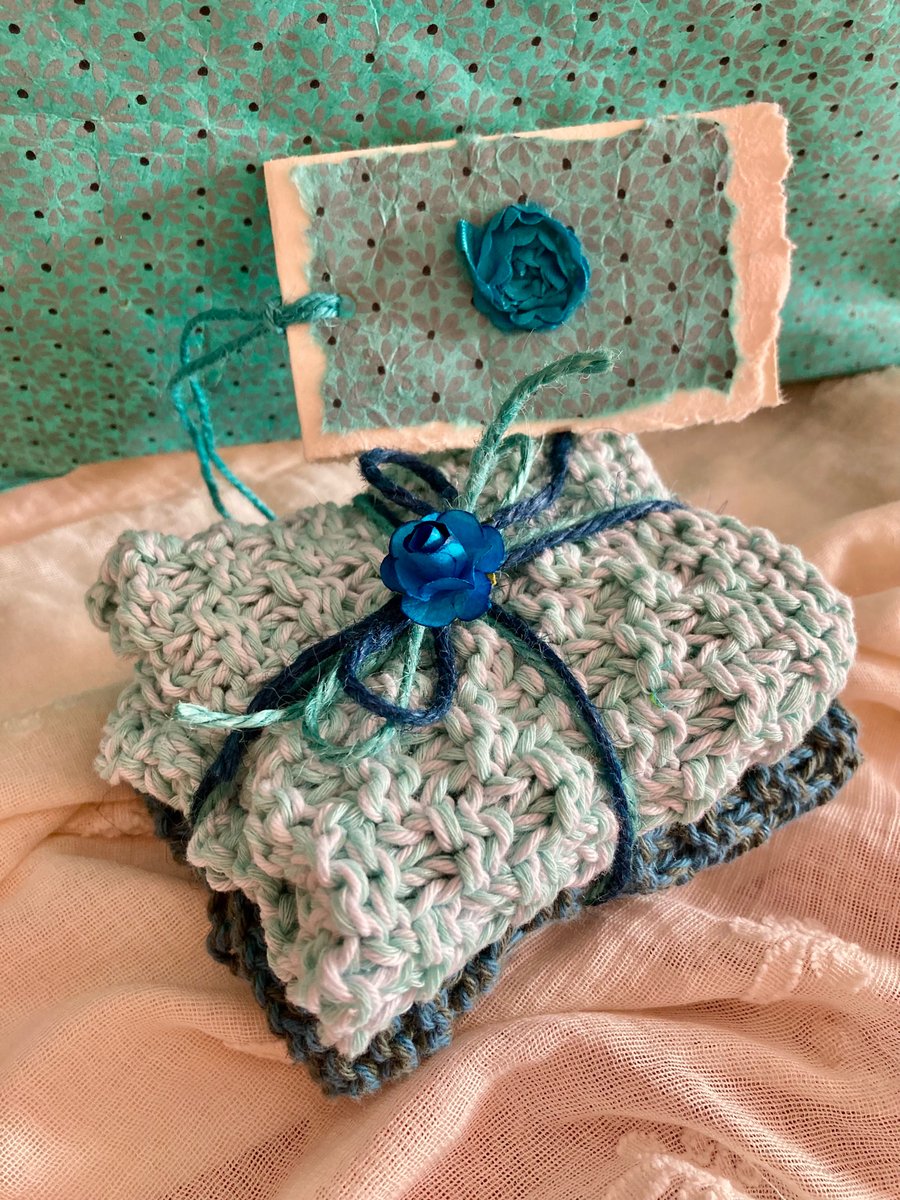 A pair of eco friendly hand knitted cotton dishcloths 