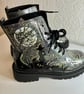 A pair of hand painted and sealed boots by Andrew Jenkins