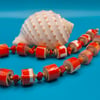 Vibrant and unique Orange paper beaded necklace
