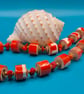 Vibrant and unique Orange paper beaded necklace