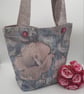Soft floral lilac and blue handbag with pockets and decorative buttons.   - Image 3