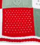 Hand Knitted Christmas Blanket with Red Tartan Fleece Backing - Image 5