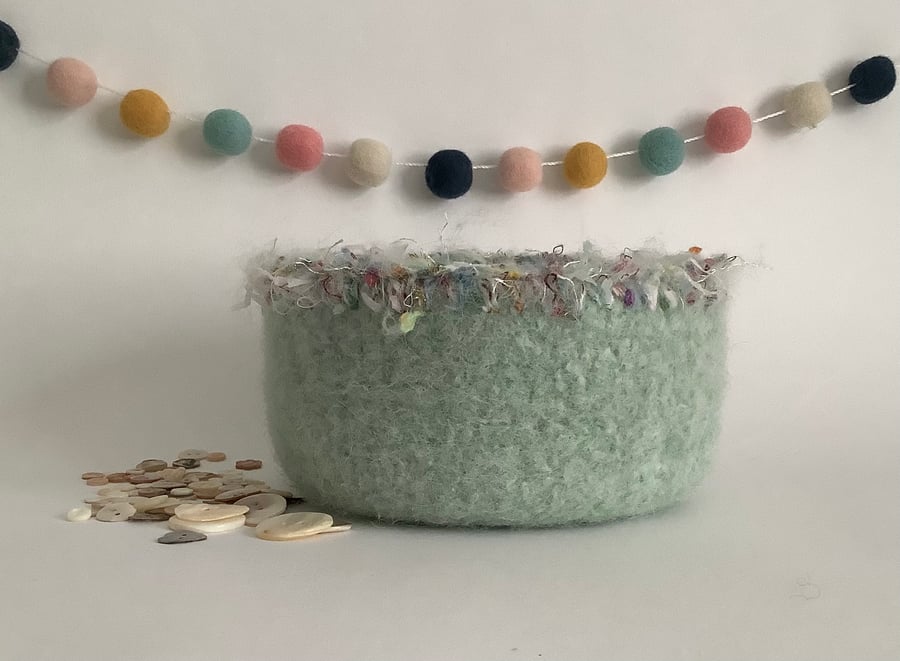 FELTED 'FUSSPOT'  BOWL ,desk tidy .Pastel green ( with decorative trim ).