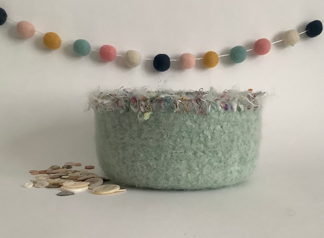 FELTED 'FUSSPOT'  BOWL ,desk tidy .Pastel green ( with decorative trim ).
