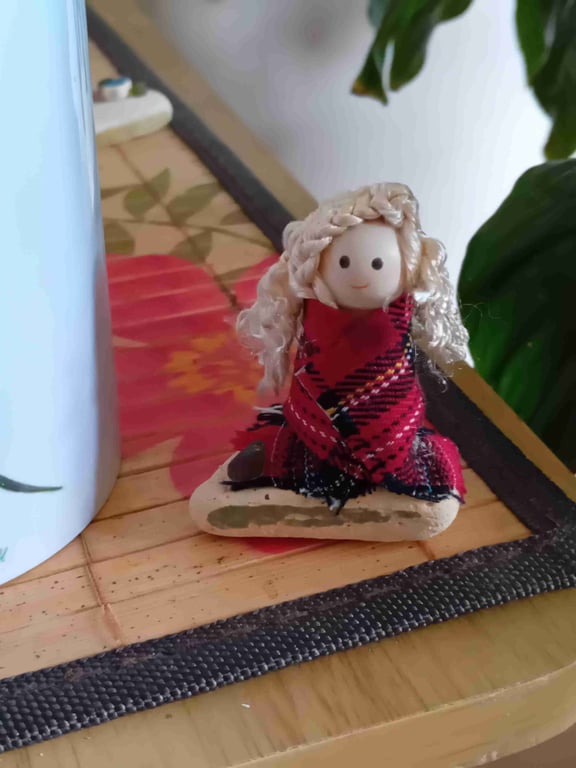 Scottish beach lady caught on a windy day brrr