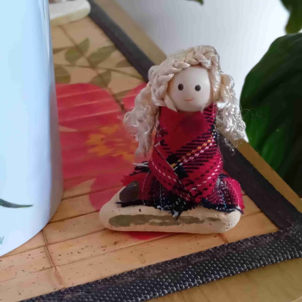 Scottish beach lady caught on a windy day brrr