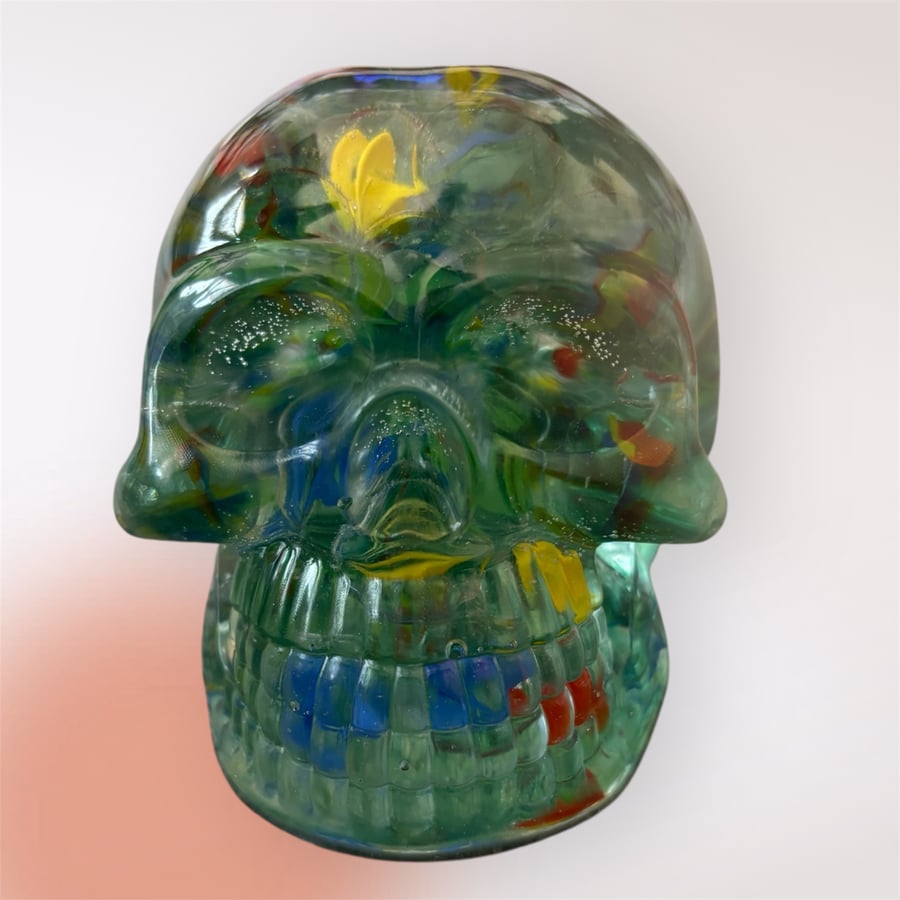 Resin made large skull with marbles inside