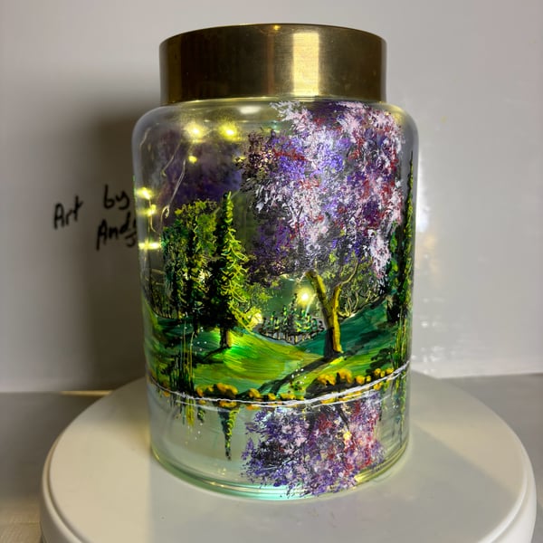 A hand painted and fired metal and glass lantern by Andrew Jenkins 