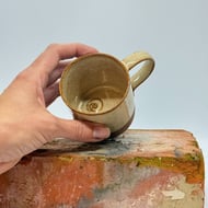 Fossil coffee cup