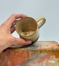 Fossil coffee cup