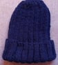 Adult hand knitted grey ribbed hat