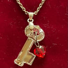 Swarovski crystal clear key and red crystal heart 