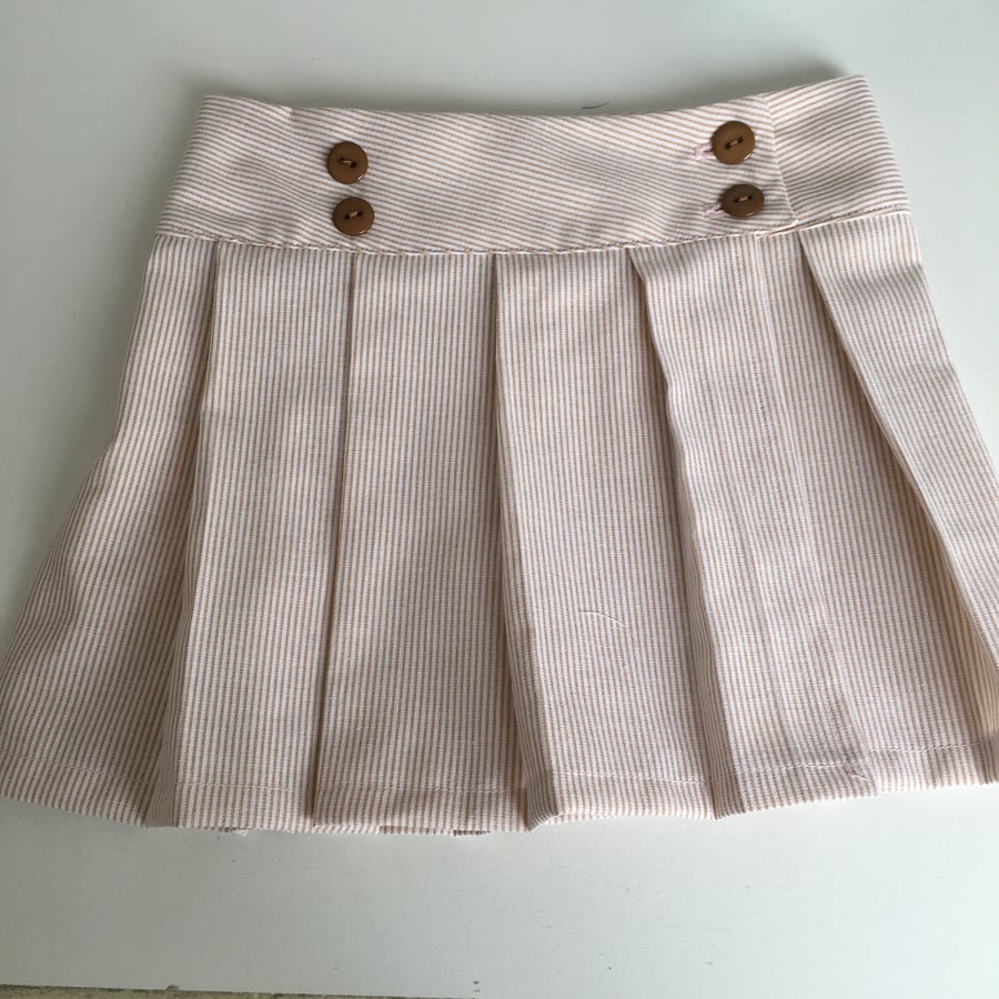 Girls pleated skirt. Cross over kilt, pleated wrap over skirt 2 yrs