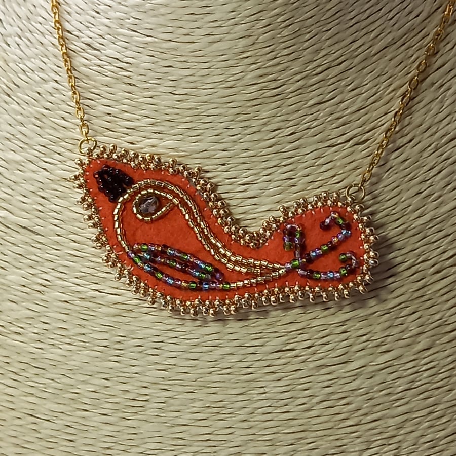 Orange bird pendant