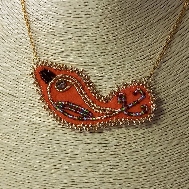 Orange bird pendant