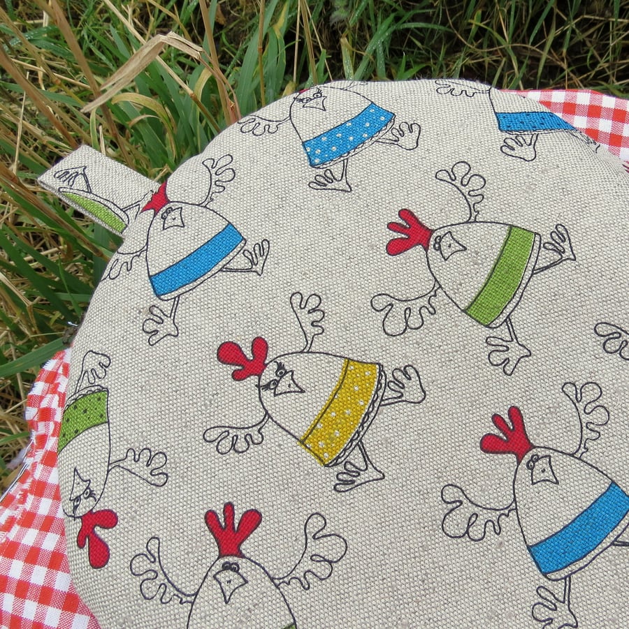 A coffee cosy.  Size large, to fit a 6 - 8 cup cafetiere.  Chickens.  