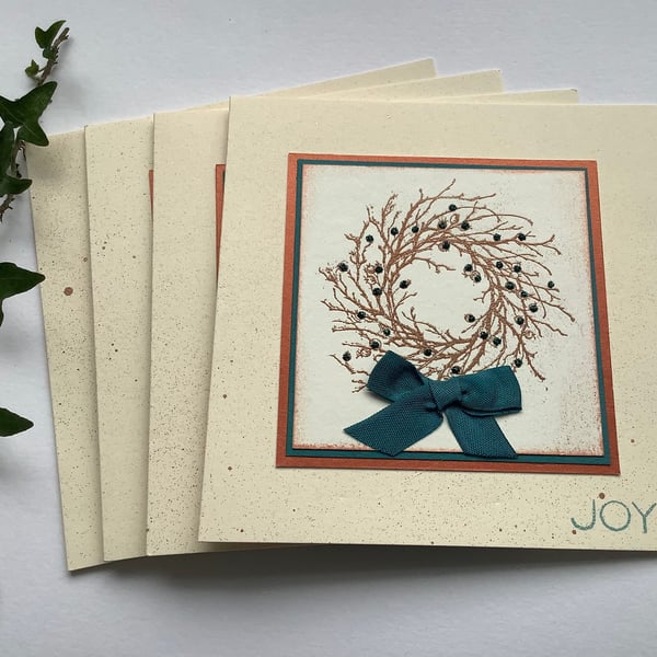 CHRISTMAS CARDS, pack of 4 , ' Joy'  .Berry wreath( ivory, copper and teal ).