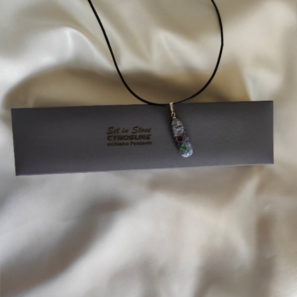 Kyanite pendant with Garnet and Emerald