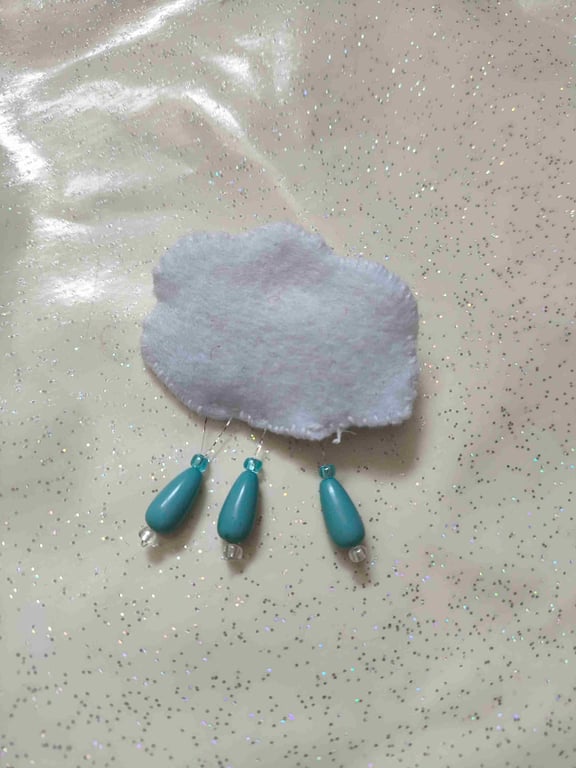 handmade rain cloud brooch