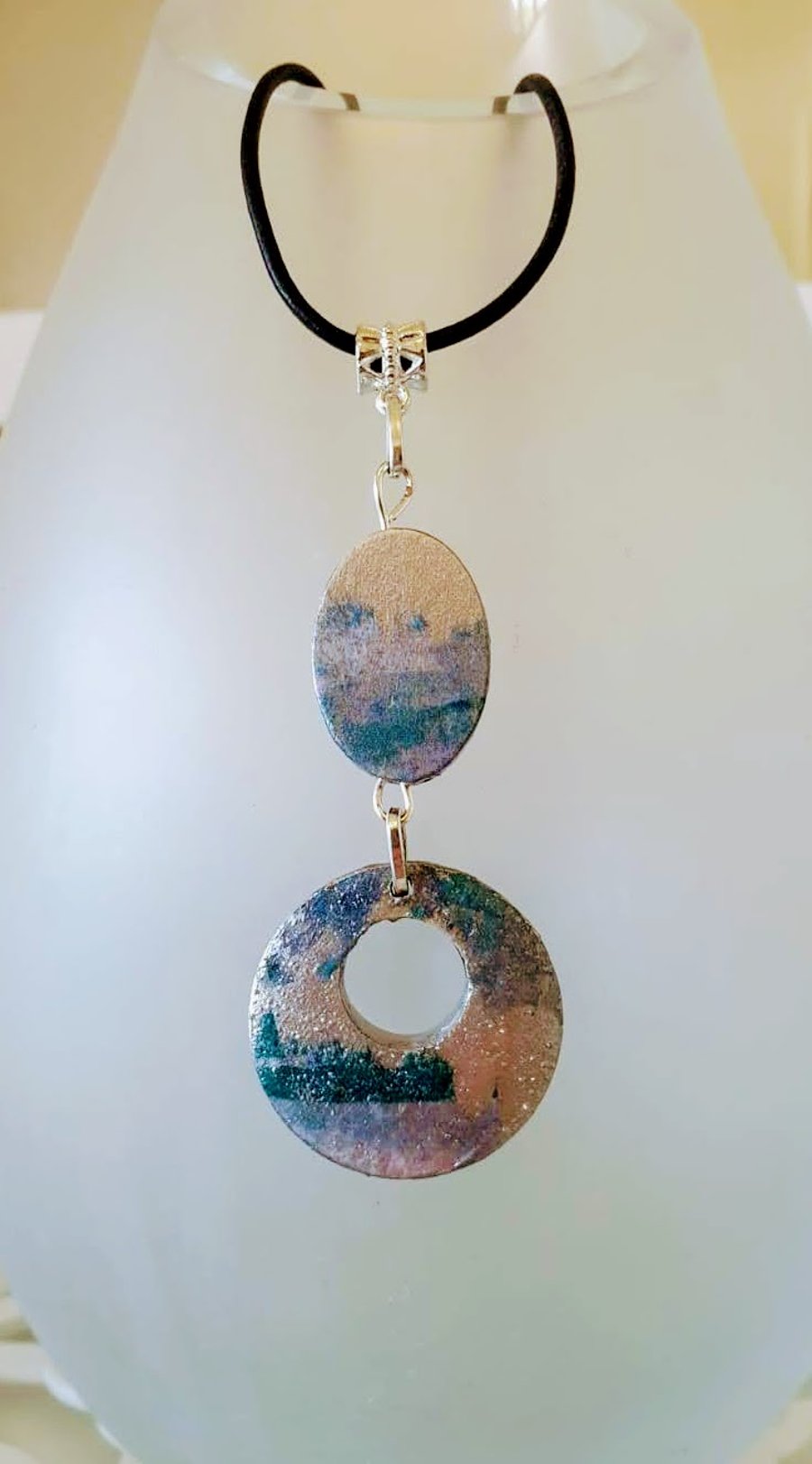 Modern wood pendant on leather cord