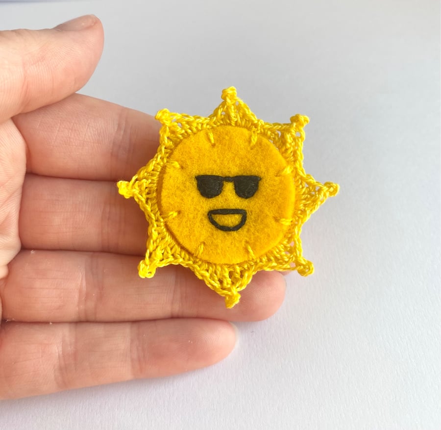 Sun brooch laughing with sun glasses wool felt and micro crochet and embroidery 