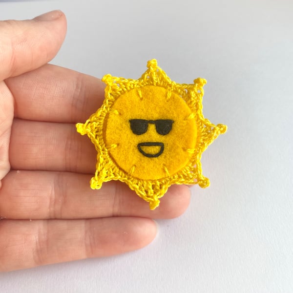 Sun brooch laughing with sun glasses wool felt and micro crochet and embroidery 