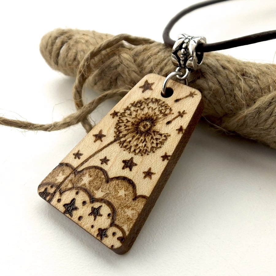 Make a wish, wooden dandelion clock pyrography pendant, with stars and clouds.