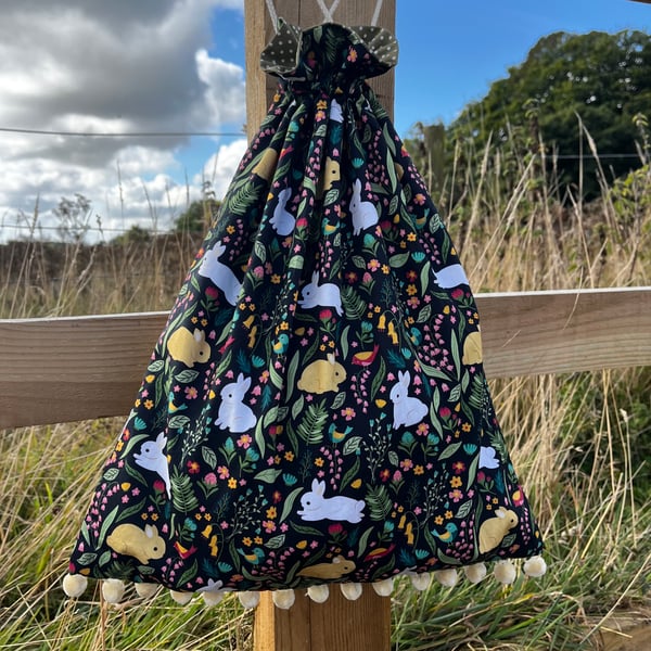 Rabbits and birds drawstring bag with pompoms and spotty cotton lining