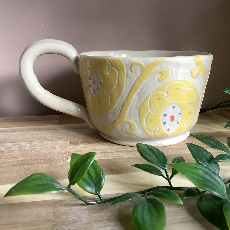 Handmade stoneware sgraffito retro flower and scroll mug tea cup
