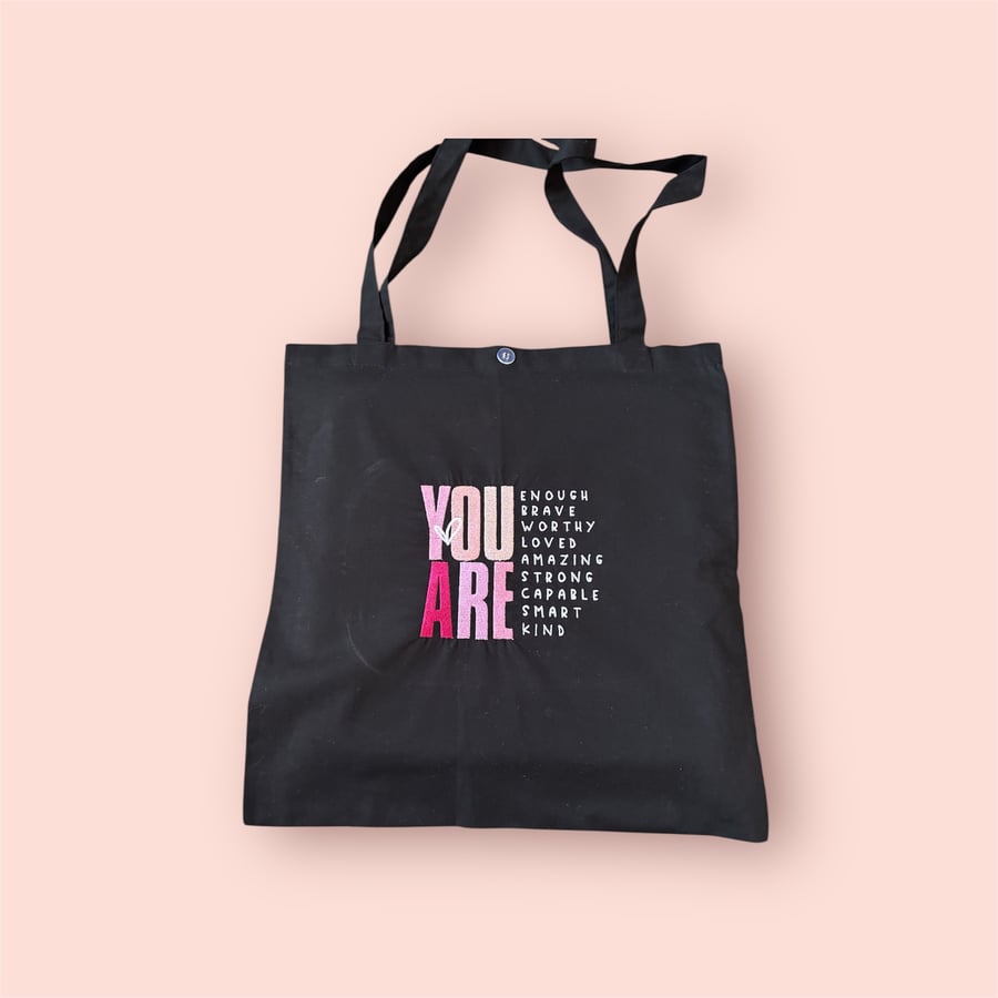 You are enough tote bag in black Embroidered 