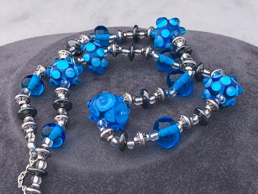 turquoise blue lampwork glass and haematite beaded necklace