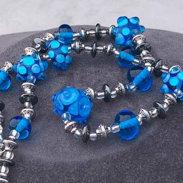 turquoise blue lampwork glass and haematite beaded necklace