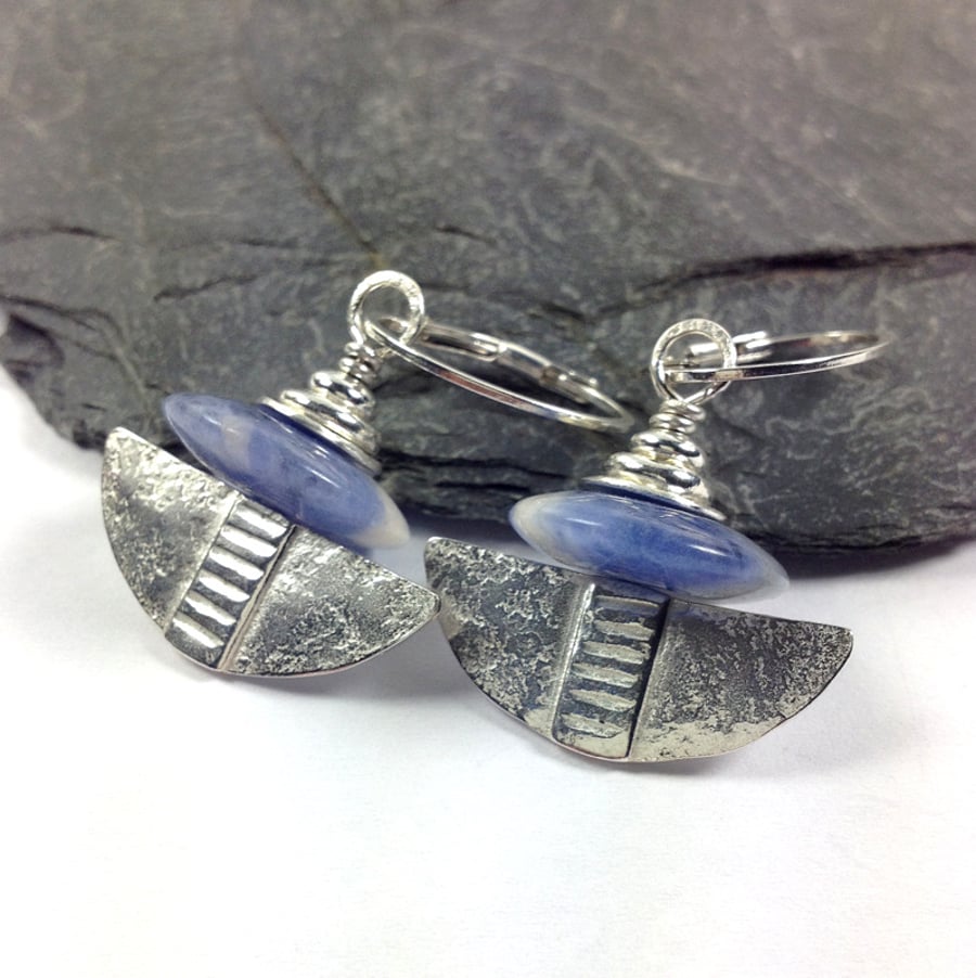 Silver and sodalite tribal blade earrings.