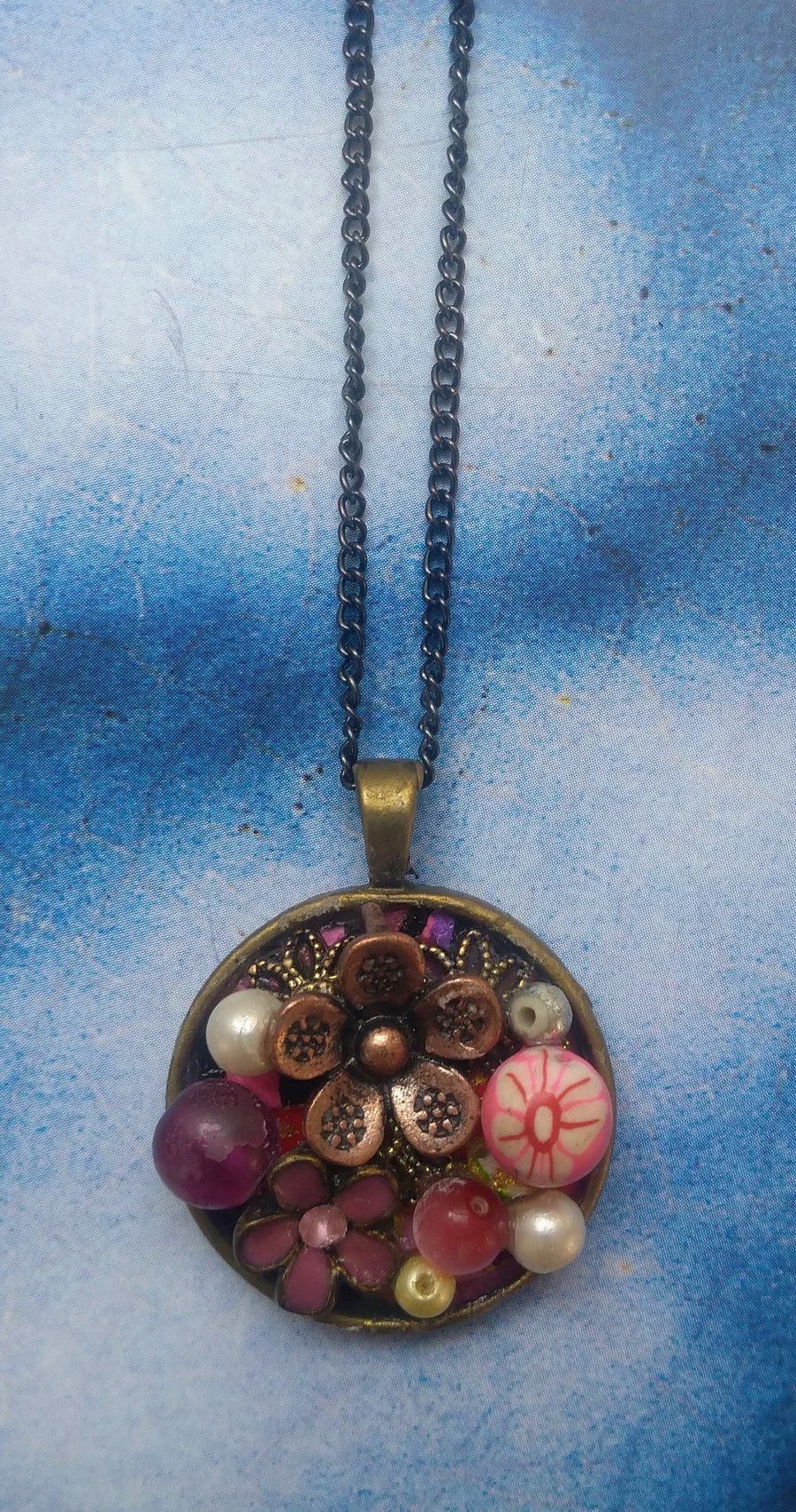 Pink and Old Bronzey Coppery Flowers in a Bejewelled Pendant