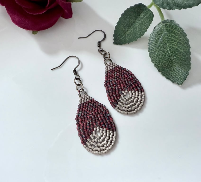 Dark red and pale matt beige beaded teardrop loop earrings