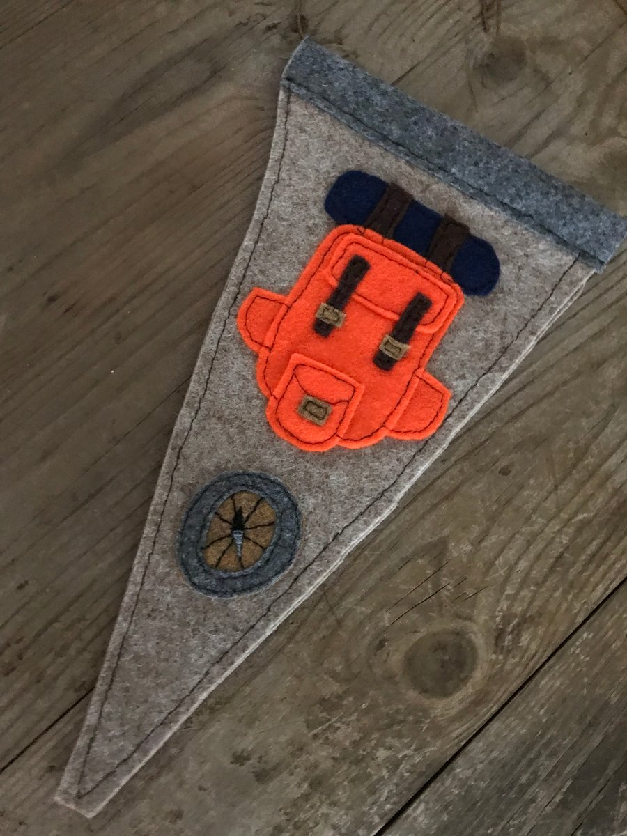 Nostalgic pennant: backpack and compass