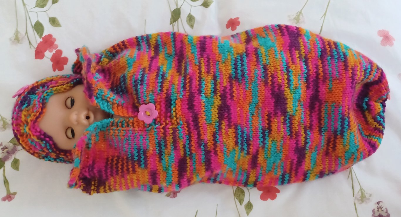 Doll Sleep Bag And Hat Hand Knitted In A Multi Coloured Yarn (A125)