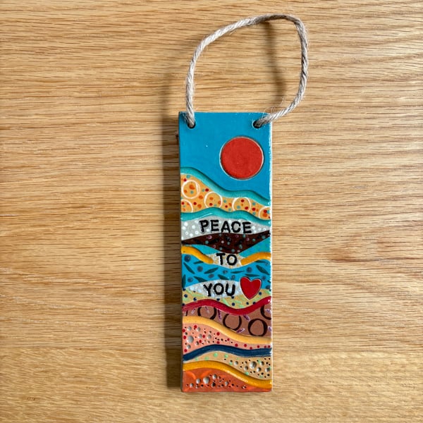 HANGING CERAMIC STONEWARE PEACE PLAQUE