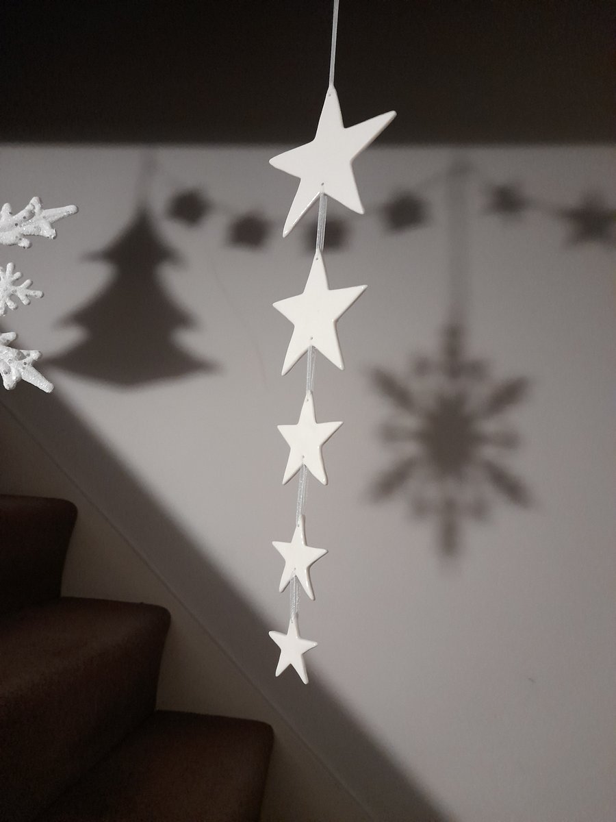Handmade porcelain paper clay star hanging decoration 