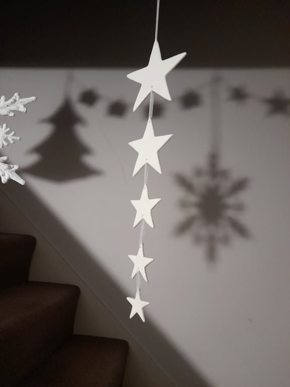 Handmade porcelain paper clay star hanging decoration 
