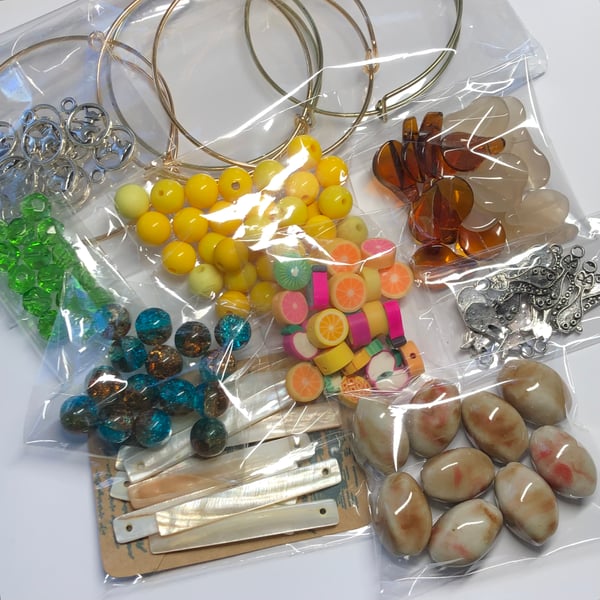 Ten packs jewellery making charms and beads