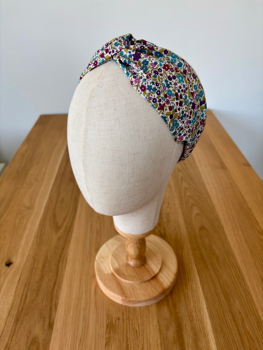 Cotton headband, twist knot style hairband in autumnal colours floral print.