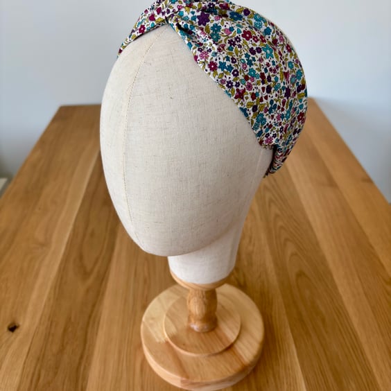 Cotton headband, twist knot style hairband in autumnal colours floral print.