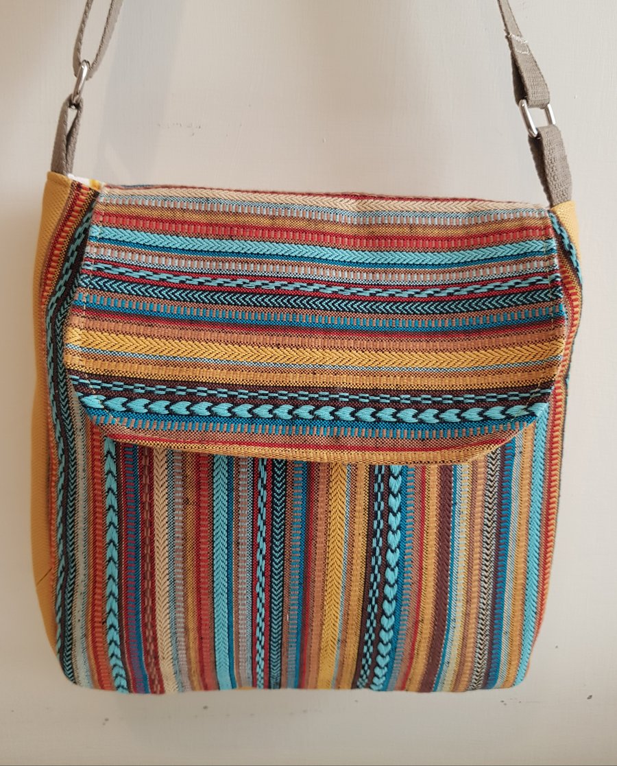 Fabric crossbody bag with adjustable strap: woven fabric with ochre