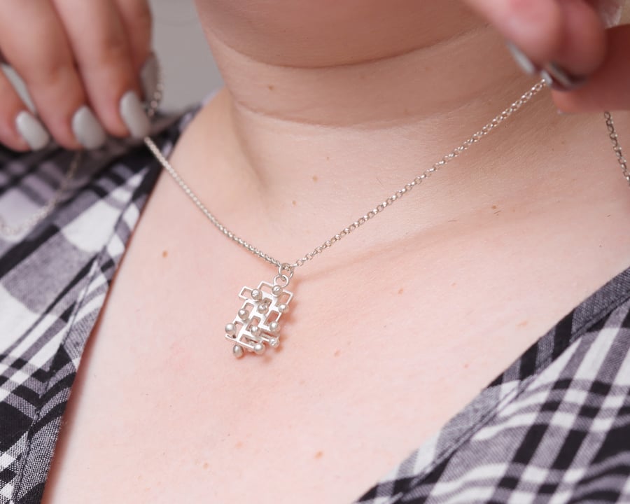 Silver necklace pendant fidget mindful jewellery style 1.