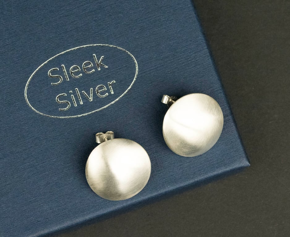 Silver domed ear studs