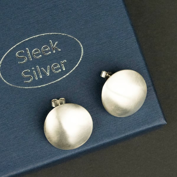 Silver domed ear studs